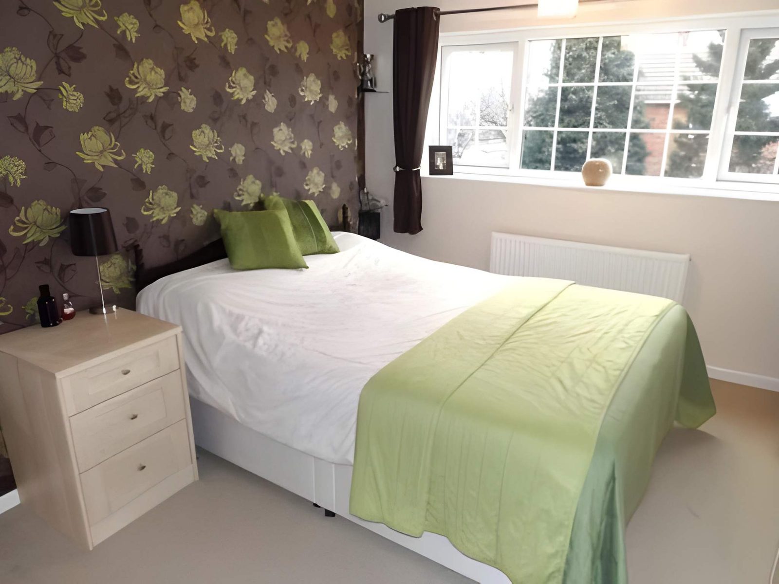Bedroom 1 with double bed and front window