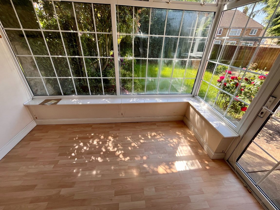 Conservatory overlooking the rear garden